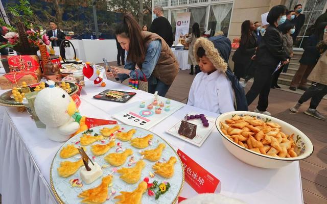 玩转京城美食"板块之一的"春歌京点小吃文化节"举行国际交流专场活动